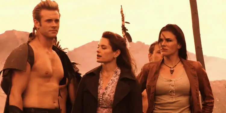 Flash Gordon (Eric Johnson), Dale Arden (Gina Holden), and Baylin (Karen Cliche) stand on Mongo on 'Flash Gordon'